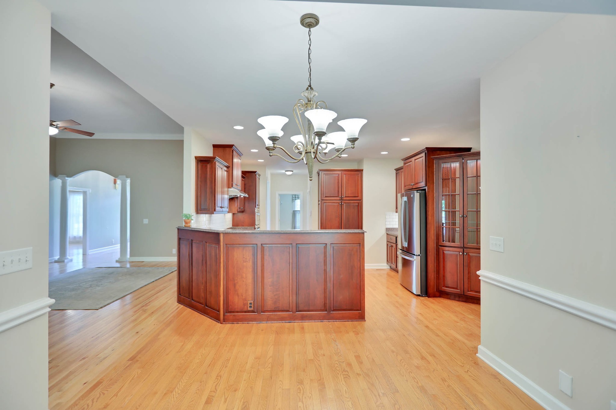 358 Spring Valley Drive Cottontown, TN 37048 - Photo 21 of 67 a view of a chandelier and wooden floor