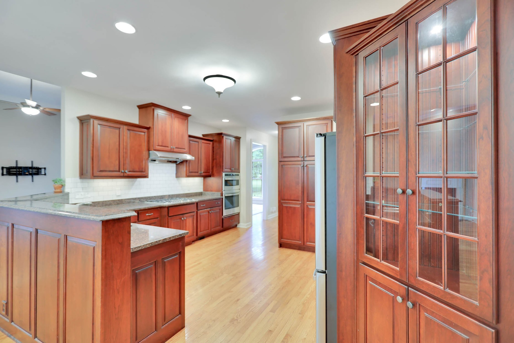 358 Spring Valley Drive Cottontown, TN 37048 - Photo 22 of 67 a large kitchen with stainless steel appliances granite countertop a refrigerator and a sink