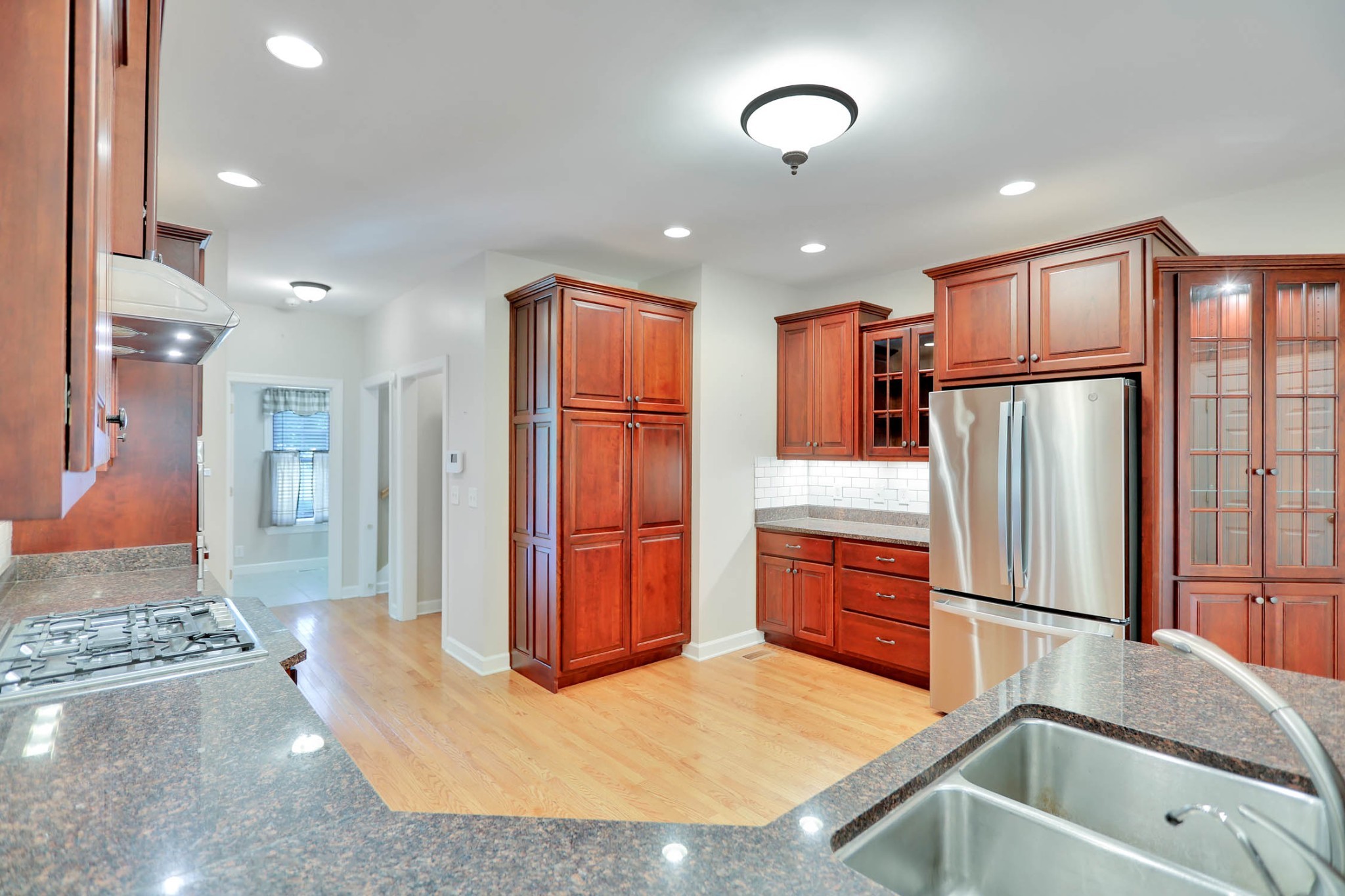 358 Spring Valley Drive Cottontown, TN 37048 - Photo 24 of 67 a kitchen with stainless steel appliances granite countertop a refrigerator and a sink