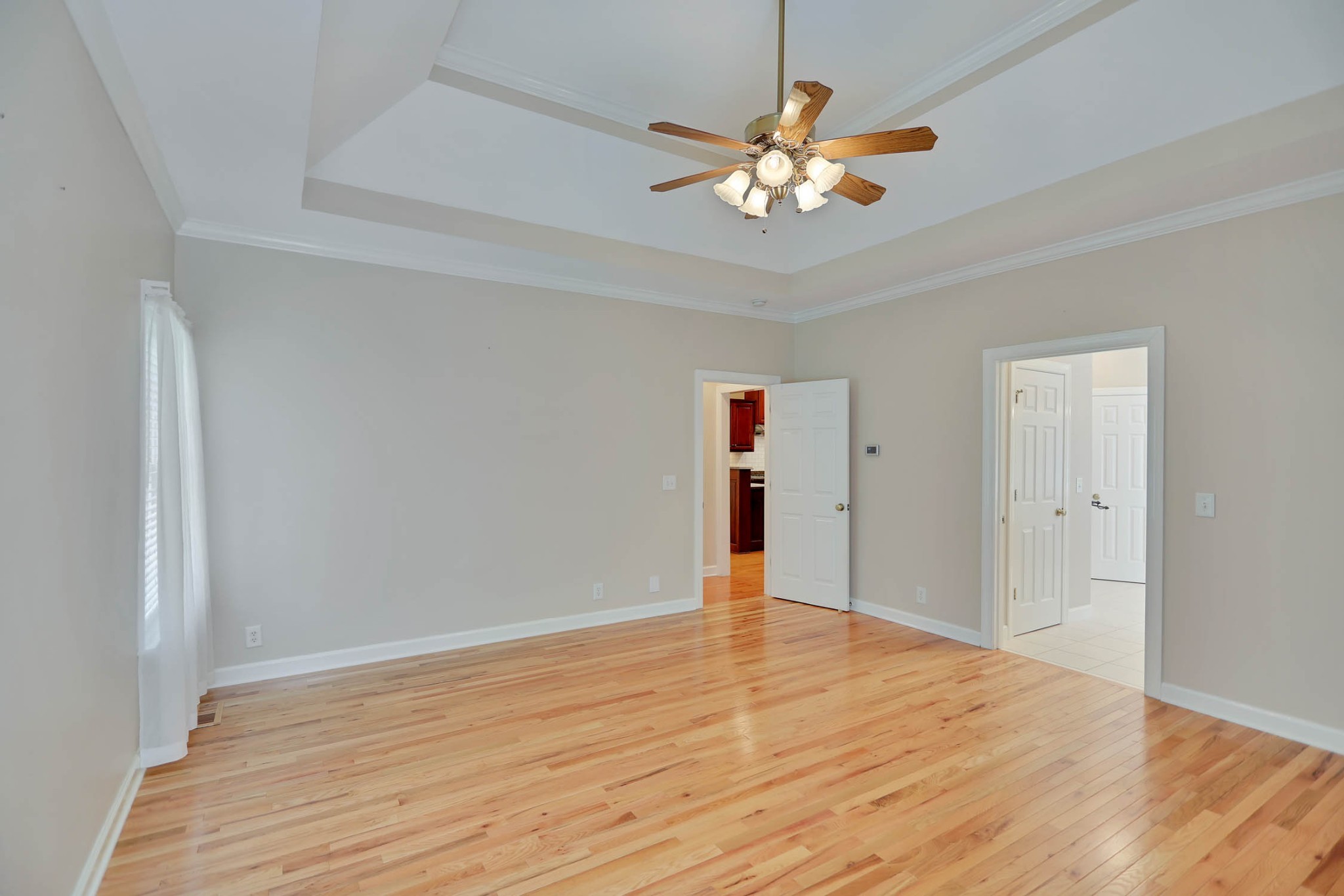 358 Spring Valley Drive Cottontown, TN 37048 - Photo 27 of 67 a view of an empty room with wooden floor