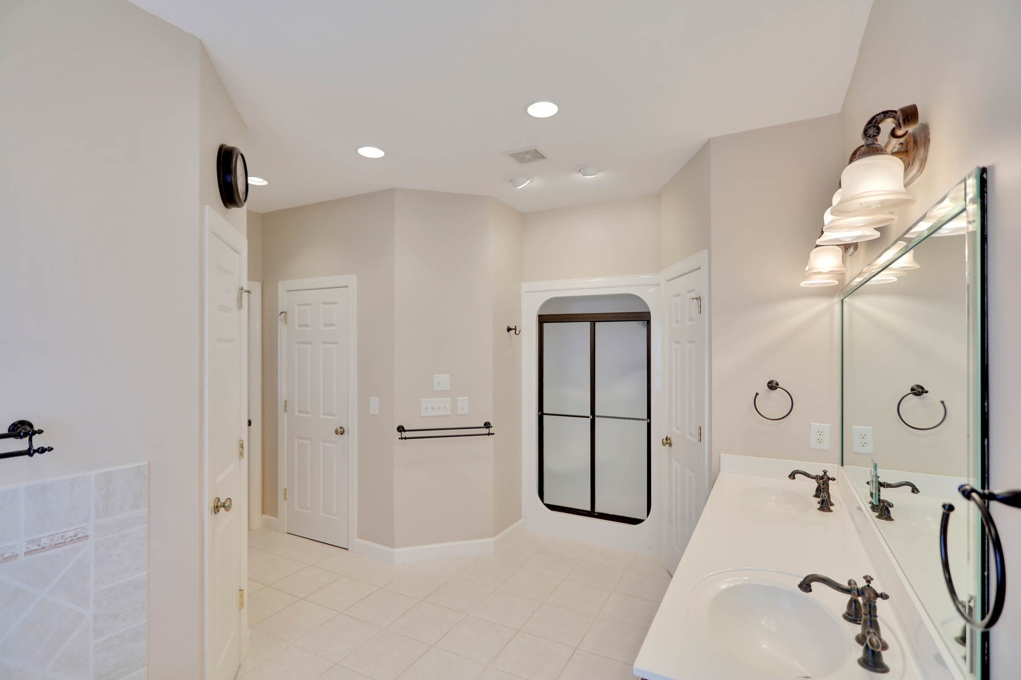 358 Spring Valley Drive Cottontown, TN 37048 - Photo 29 of 67 a spacious bathroom with a tub shower and mirror
