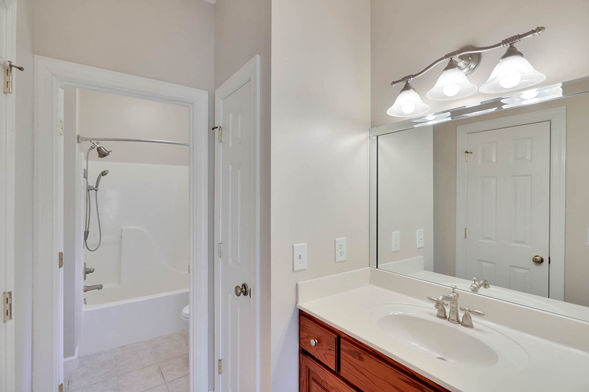 358 Spring Valley Drive Cottontown, TN 37048 - Photo 37 of 67 a bathroom with a sink a shower and a mirror