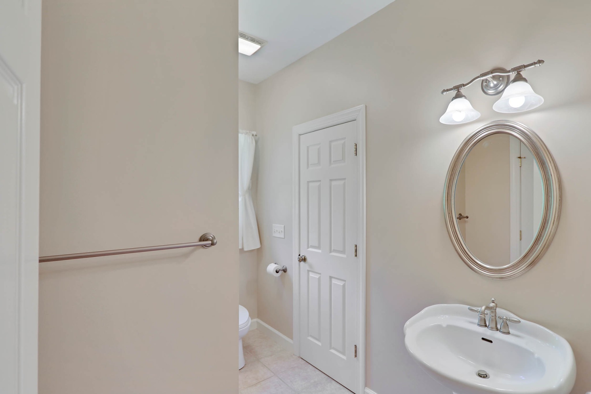 358 Spring Valley Drive Cottontown, TN 37048 - Photo 39 of 67 a bathroom with a sink and a mirror