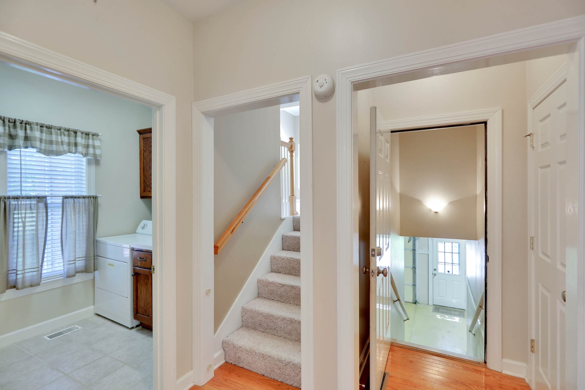 358 Spring Valley Drive Cottontown, TN 37048 - Photo 44 of 67 a view of a hallway with wooden floor and staircase
