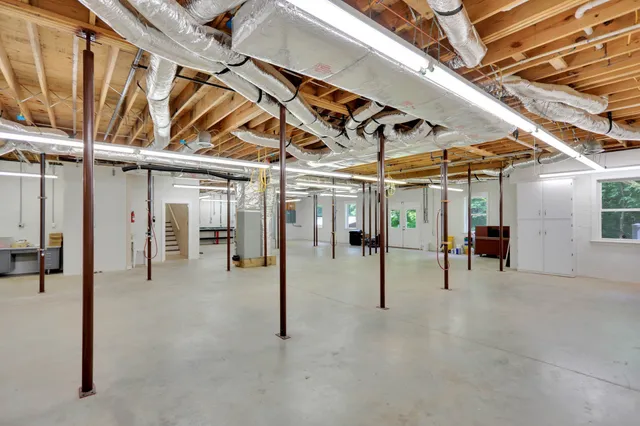 a front view of a house with a yard and porch