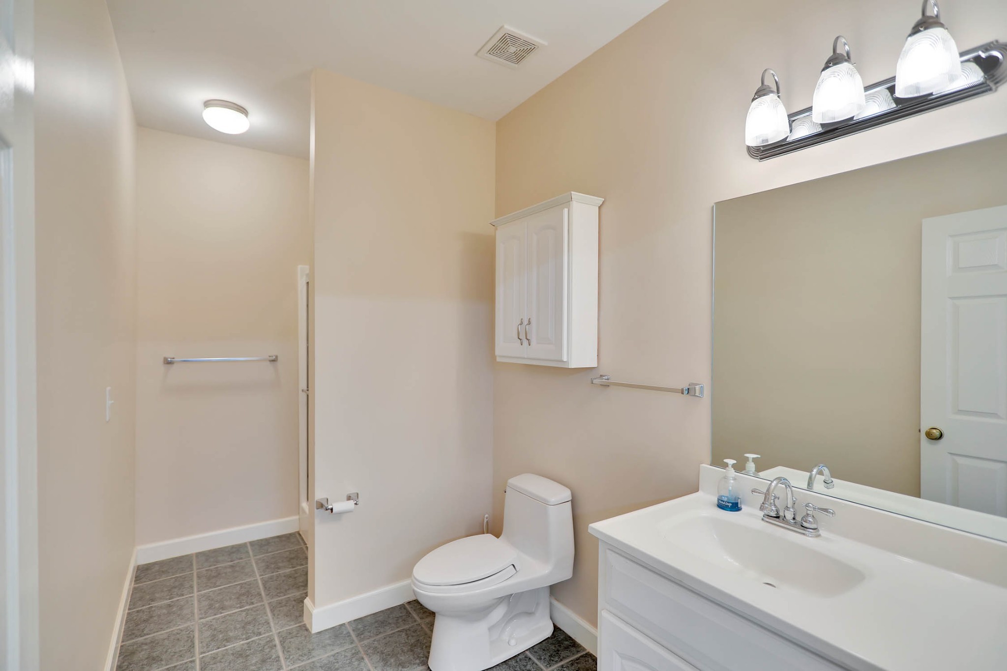 358 Spring Valley Drive Cottontown, TN 37048 - Photo 49 of 67 a bathroom with a sink toilet and a mirror