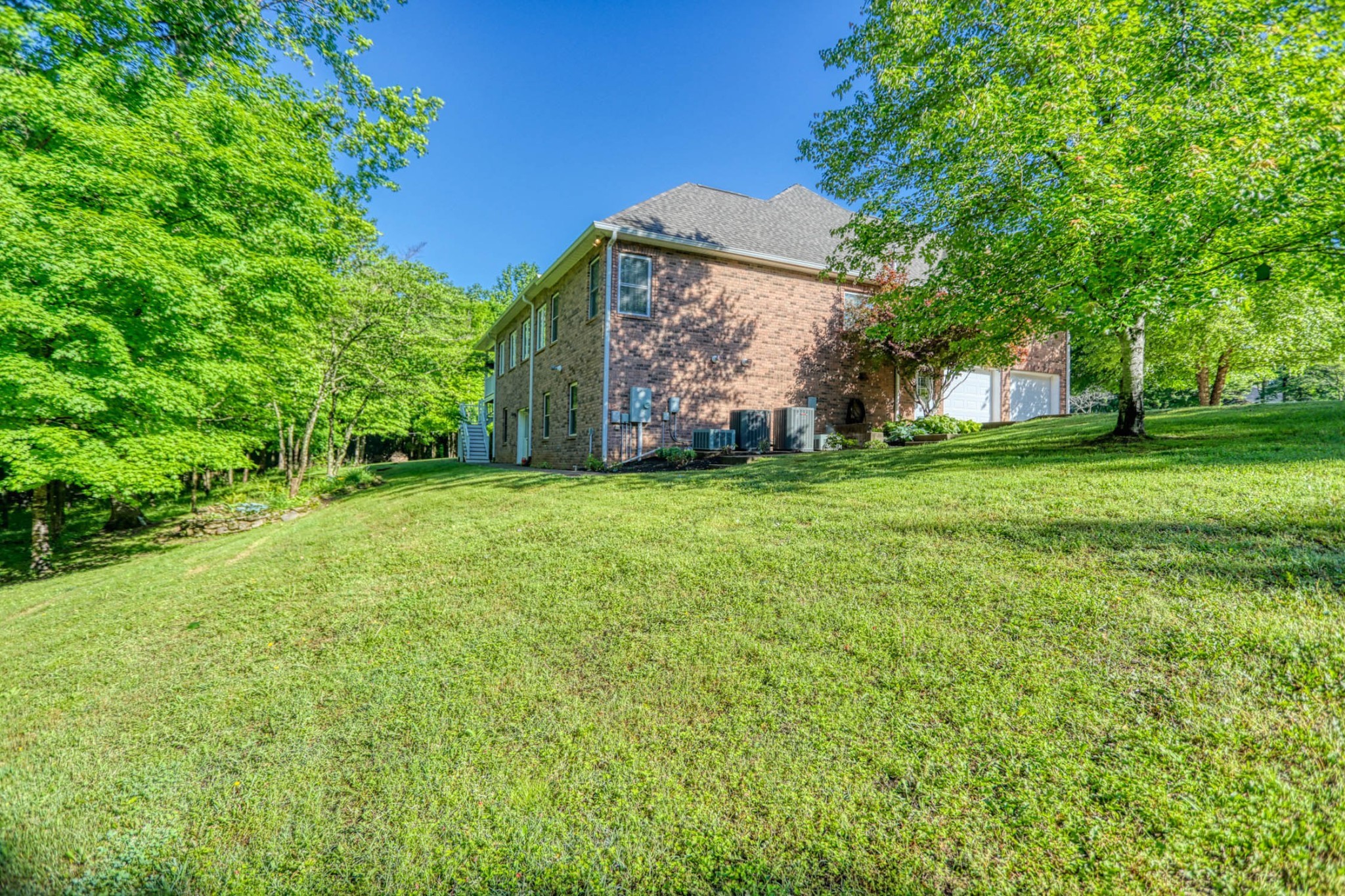 358 Spring Valley Drive Cottontown, TN 37048 - Photo 55 of 67 a view of a trees with a big yard
