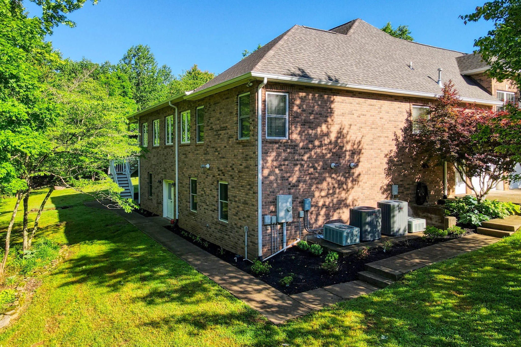 358 Spring Valley Drive Cottontown, TN 37048 - Photo 56 of 67 a view of a house with a yard