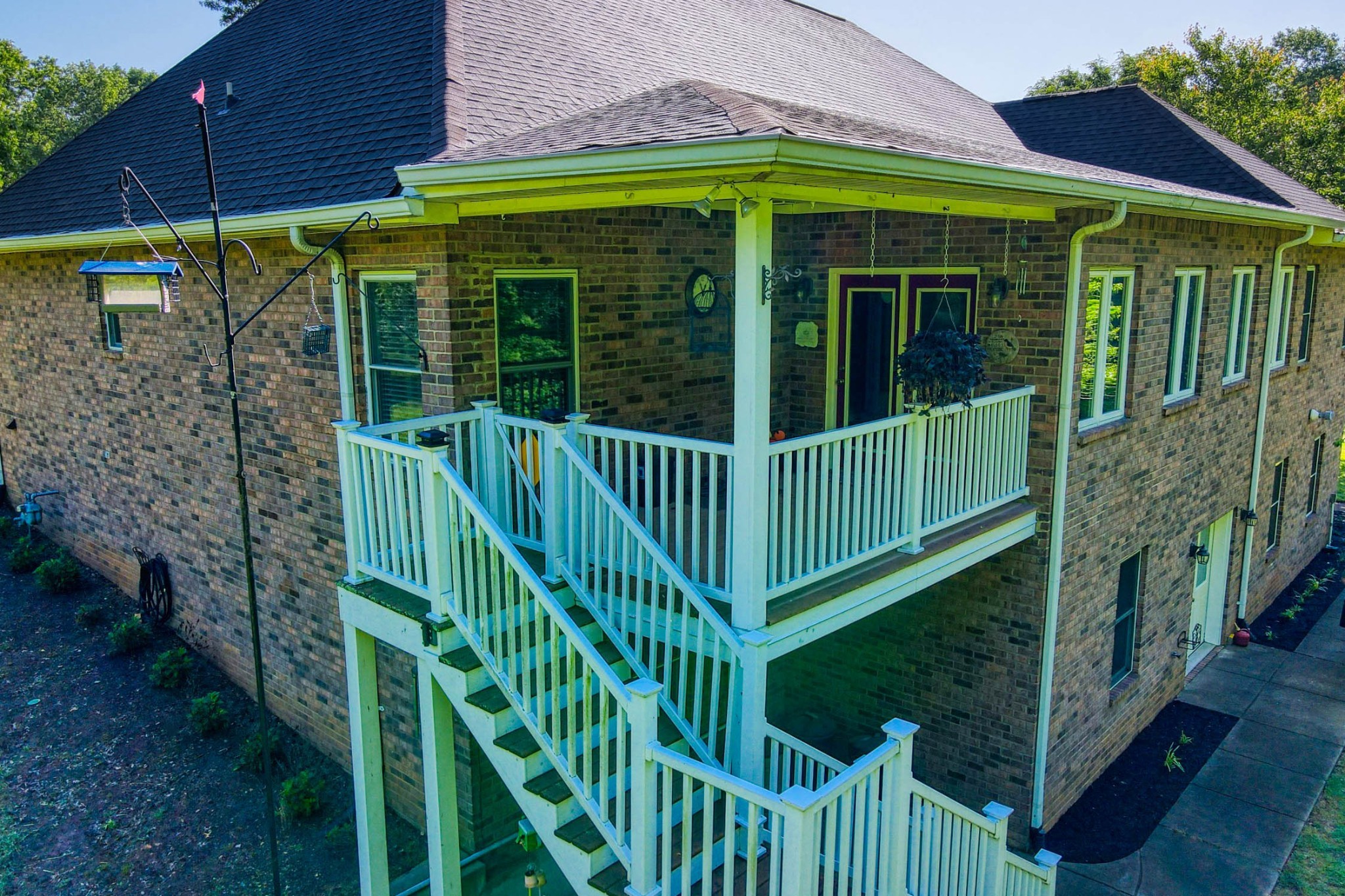 358 Spring Valley Drive Cottontown, TN 37048 - Photo 58 of 67 a view of a house with a small yard and wooden floor and fence