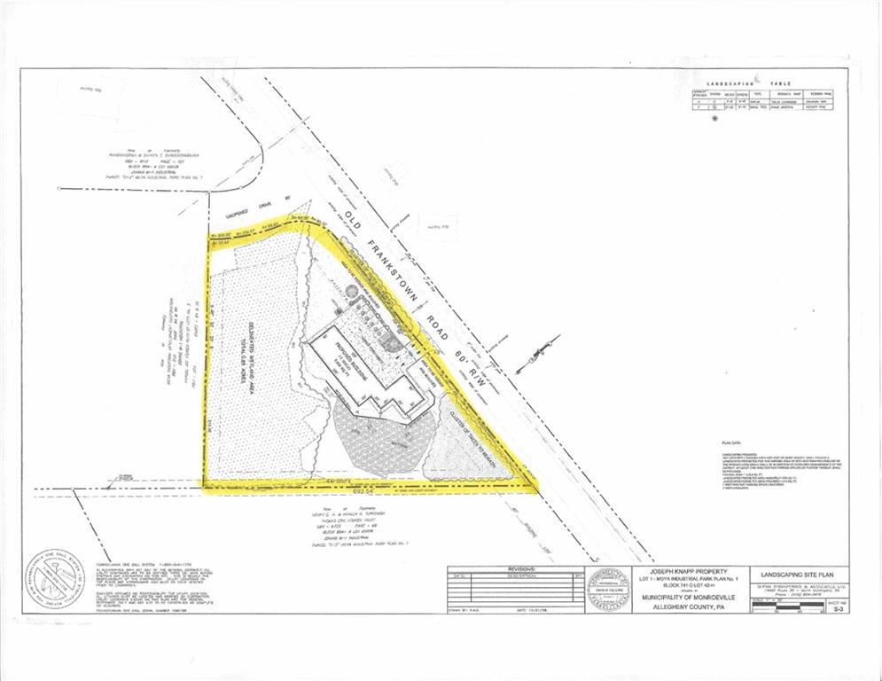 a black and white photo of a living room