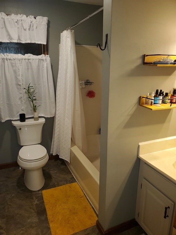 149 Dale Street, Unit S Chicopee, MA 01020 - Photo 13 of 21 a bathroom with a toilet and a shower