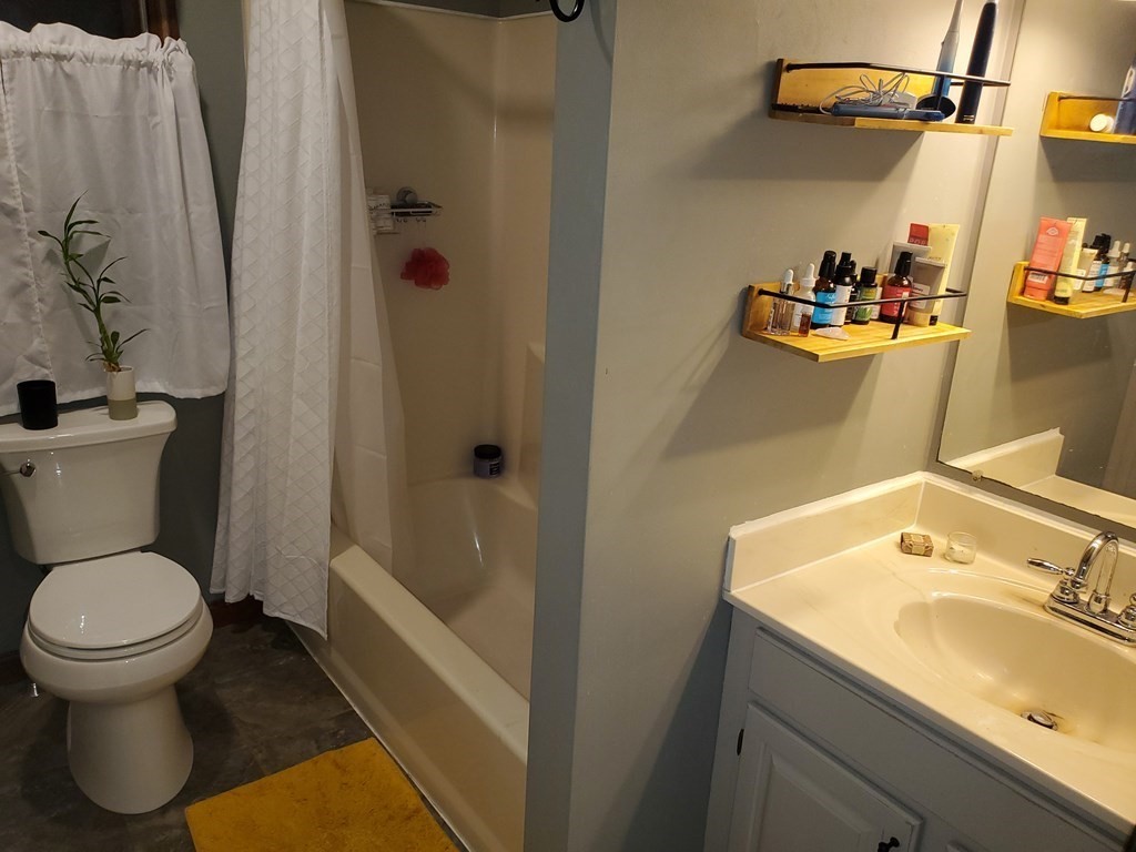 149 Dale Street, Unit S Chicopee, MA 01020 - Photo 14 of 21 a bathroom with a sink toilet and shower