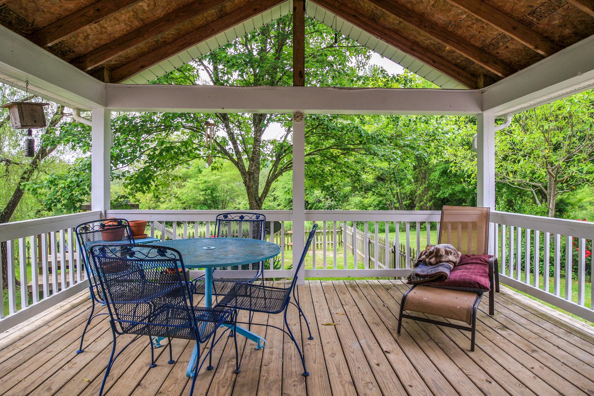 550 Kelley Road Prospect, TN 38477 - Photo 20 of 30 a view of balcony with furniture and wooden deck