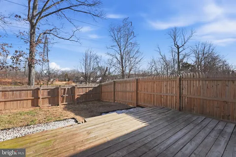 a view of a backyard of the house