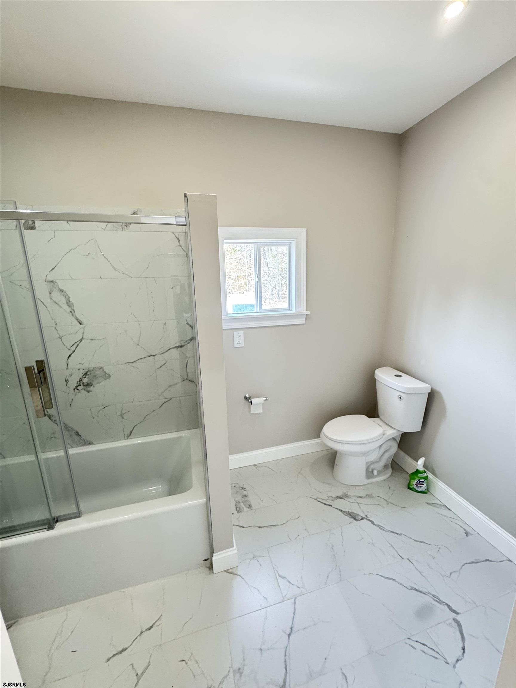 172 Old Port Republic Road Galloway Township, NJ 08205 - Photo 11 of 35 a bathroom with a bathtub and toilet