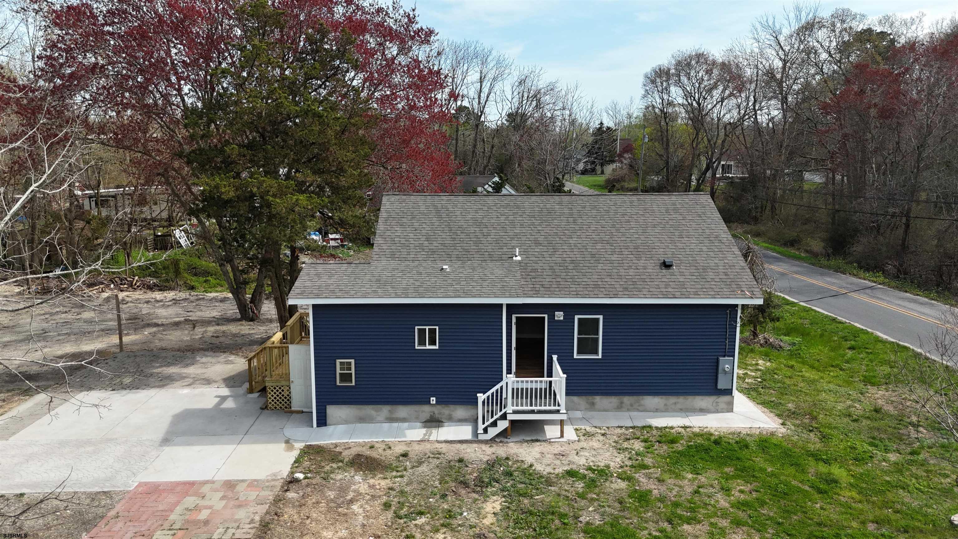 172 Old Port Republic Road Galloway Township, NJ 08205 - Photo 2 of 35 a front view of a house with a yard