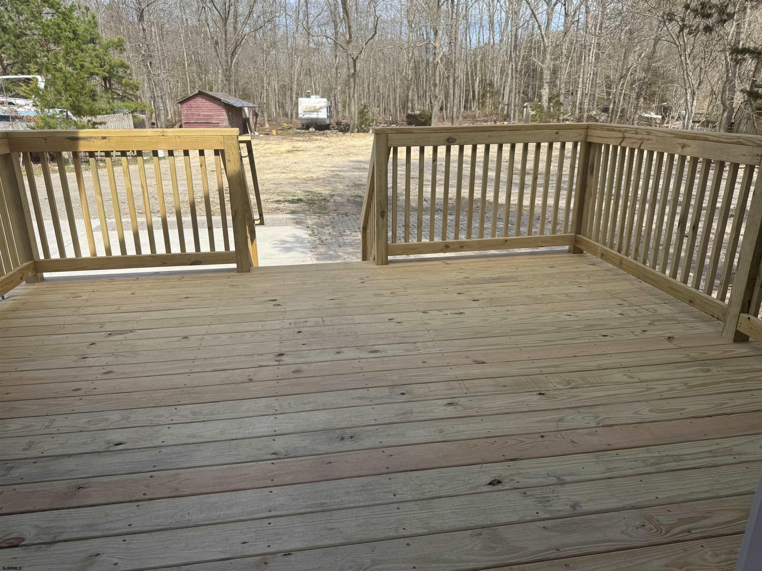 172 Old Port Republic Road Galloway Township, NJ 08205 - Photo 22 of 35 a view of a porch with wooden floor