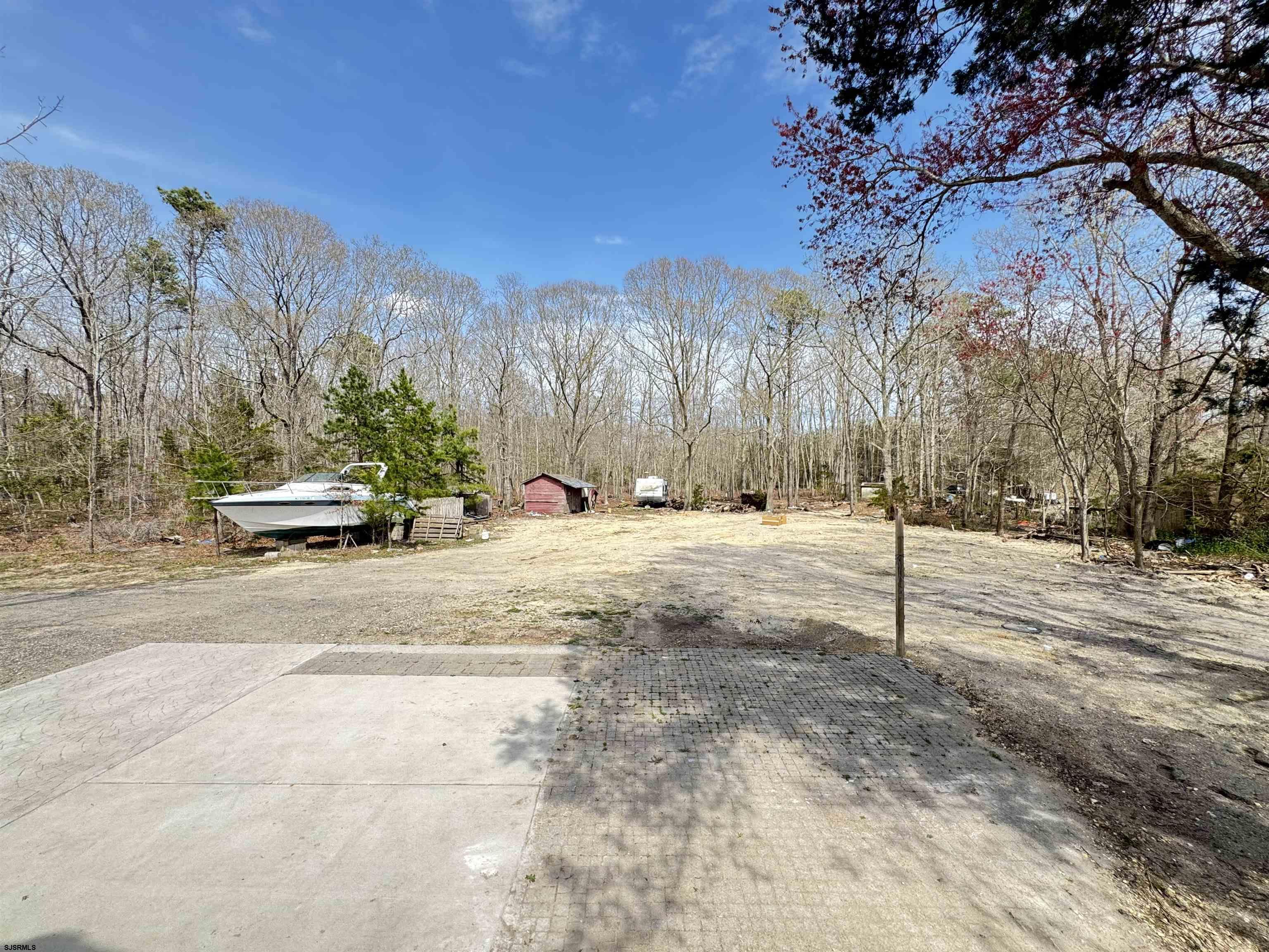 172 Old Port Republic Road Galloway Township, NJ 08205 - Photo 23 of 35 a view of road with trees