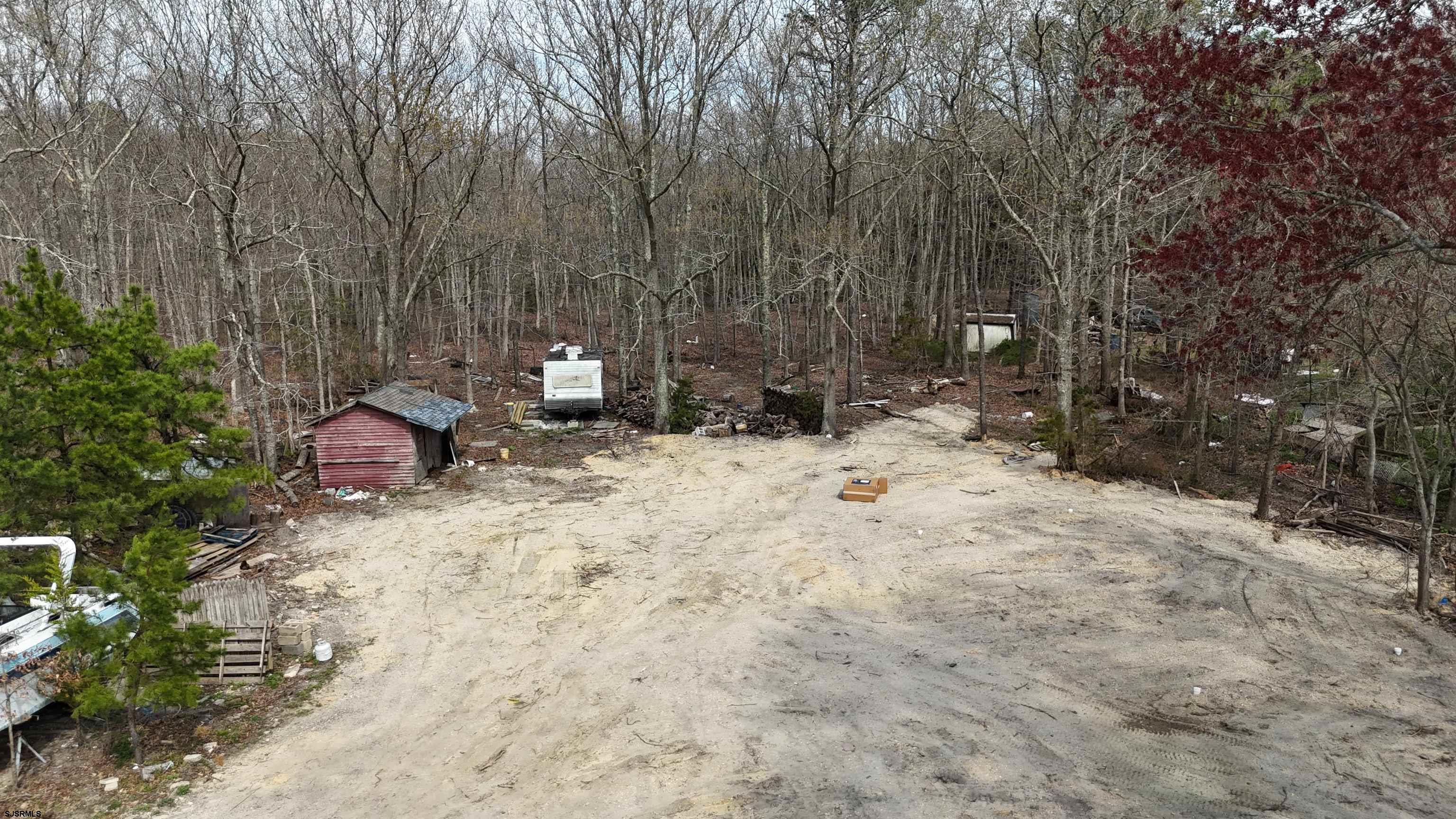 172 Old Port Republic Road Galloway Township, NJ 08205 - Photo 35 of 35 a backyard of a house with lots of green space and trees