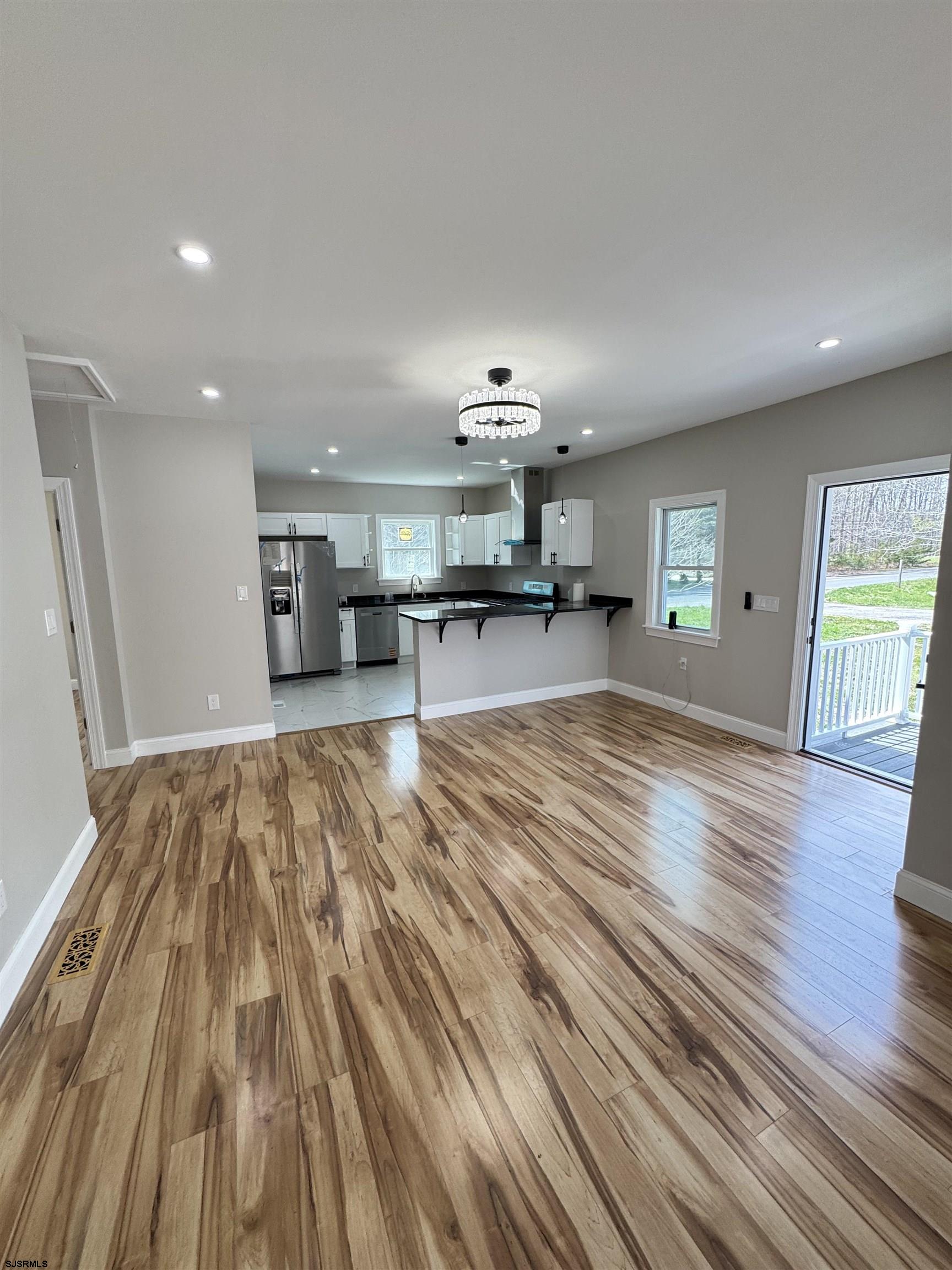 172 Old Port Republic Road Galloway Township, NJ 08205 - Photo 5 of 35 a view of empty room with wooden floor