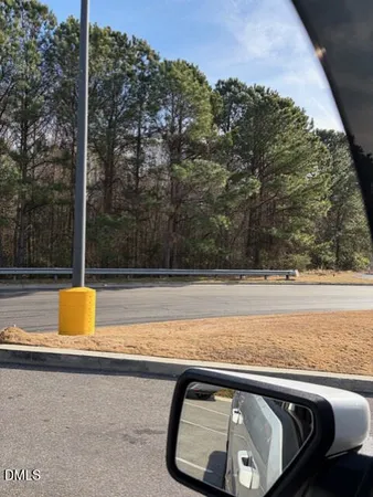 a view of swimming pool with a yard