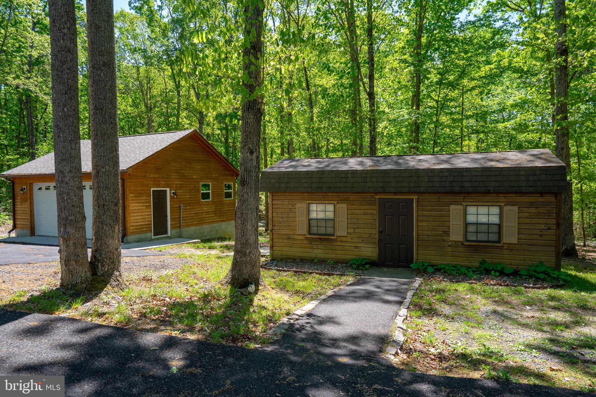 10706 Ropers Run Bumpass, VA 23024 - Photo 64 of 76 a front view of a house with garden