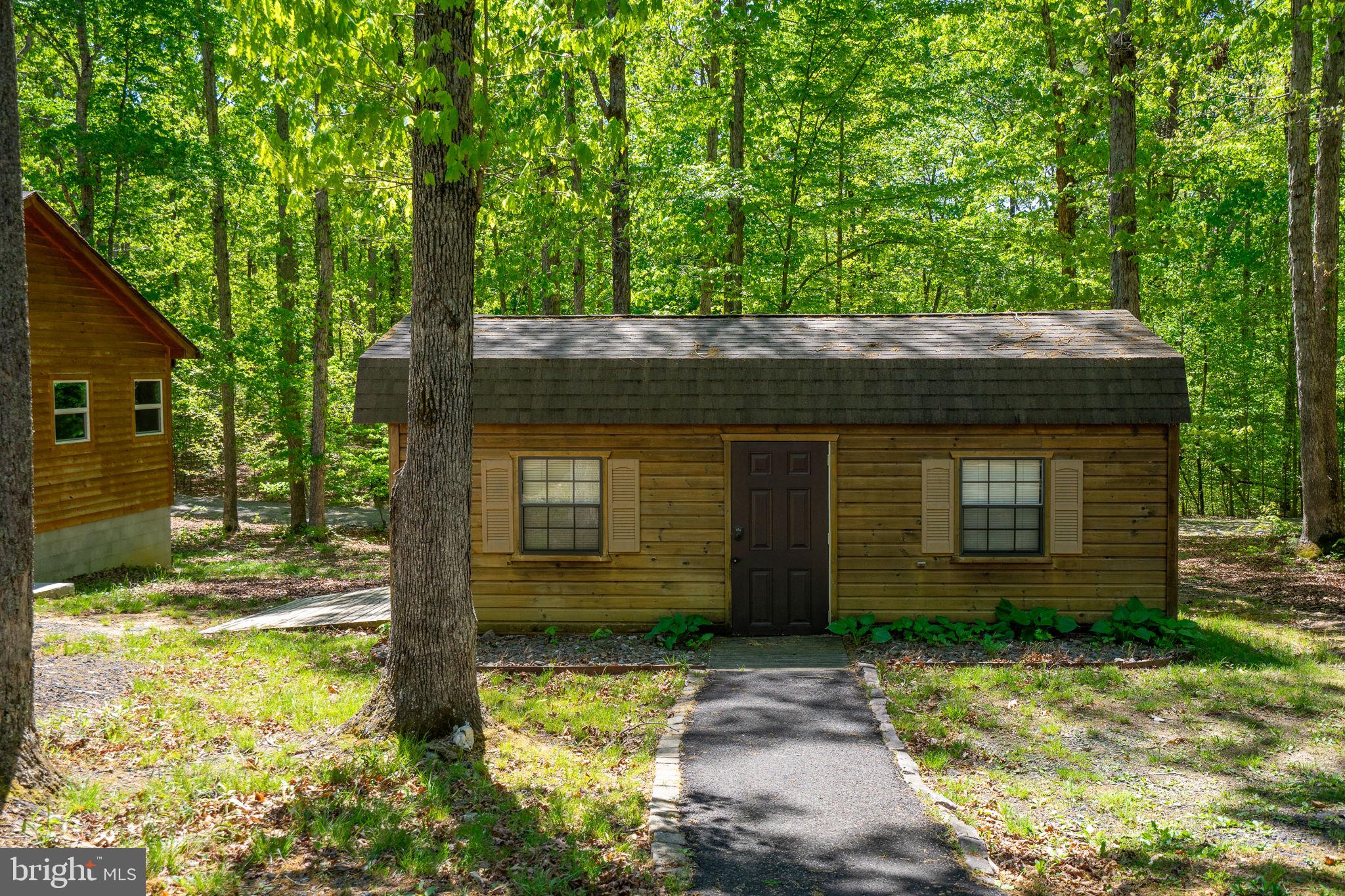 10706 Ropers Run Bumpass, VA 23024 - Photo 65 of 76 a front view of a house with garden
