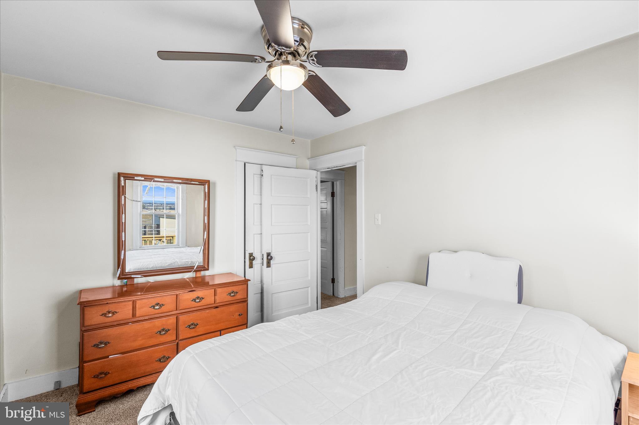 2960 Hanover Pike Hanover, PA 17331 - Photo 17 of 38 a bedroom with a bed and a dresser