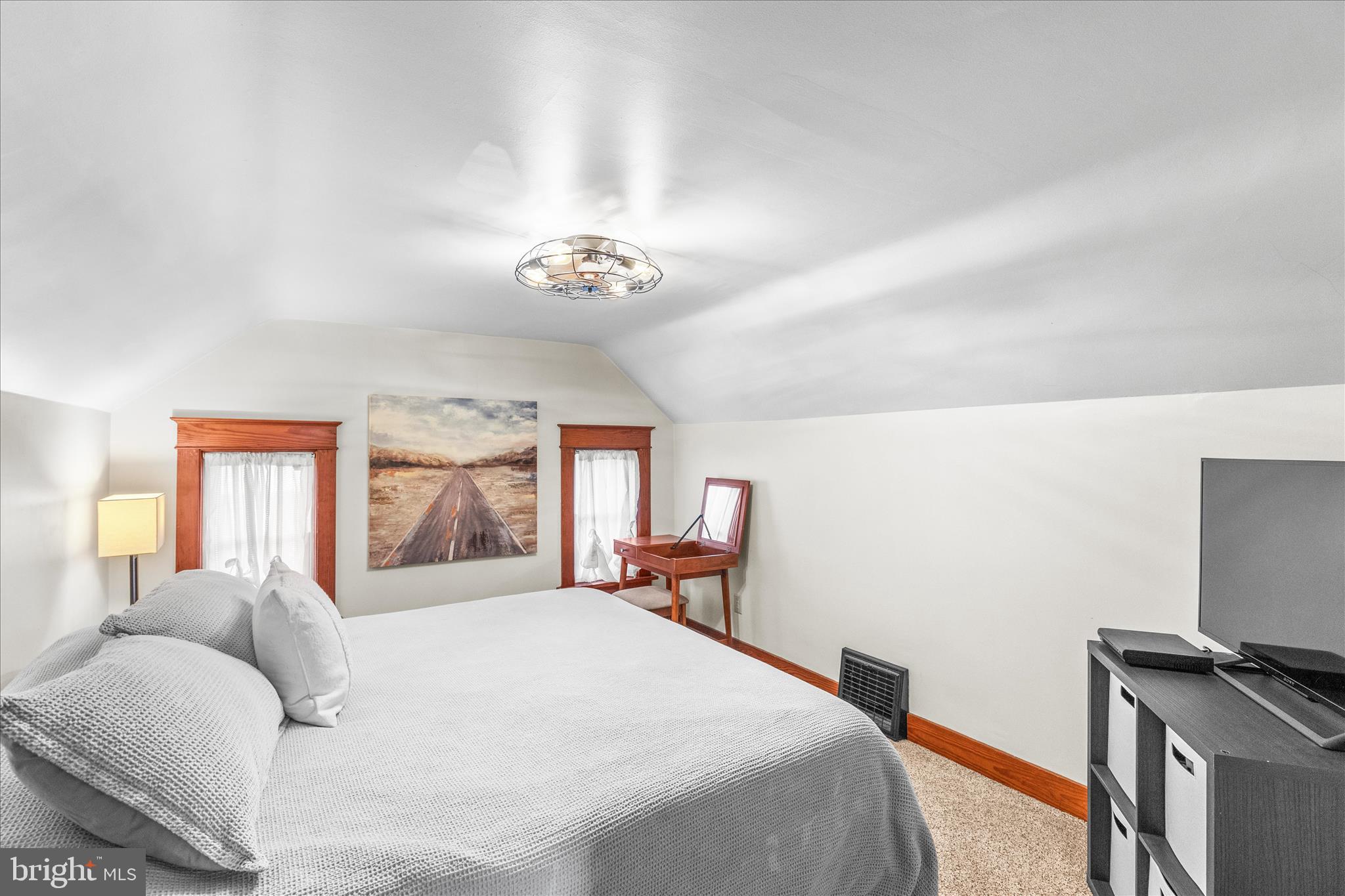 2960 Hanover Pike Hanover, PA 17331 - Photo 20 of 38 a bedroom with a bed and a chandelier