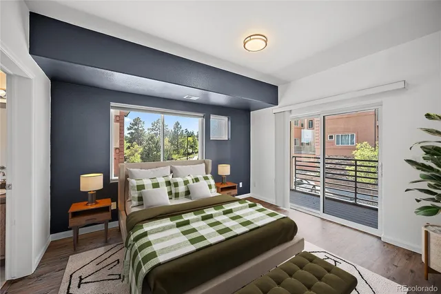 a bathroom with a toilet a sink and a mirror