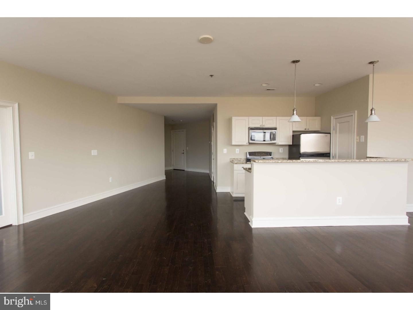 201 North 8th Street, Unit 809 Philadelphia, PA 19106 - Photo 12 of 24 a view of a kitchen with a sink