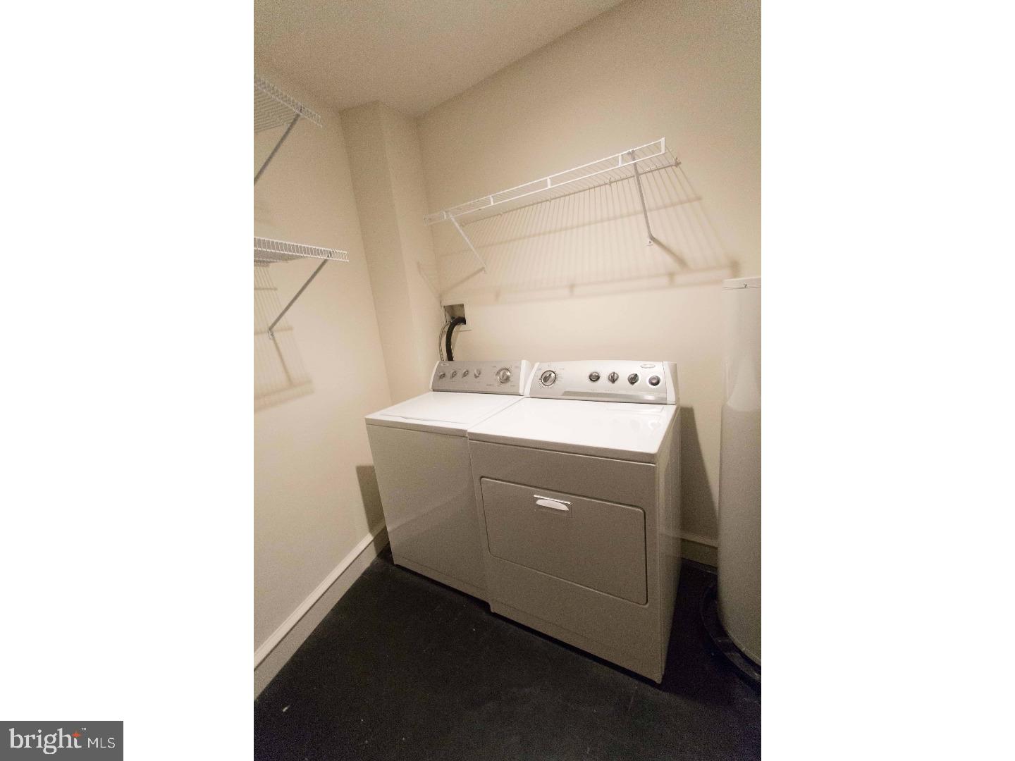 201 North 8th Street, Unit 809 Philadelphia, PA 19106 - Photo 22 of 24 a utility room with dryer and washer
