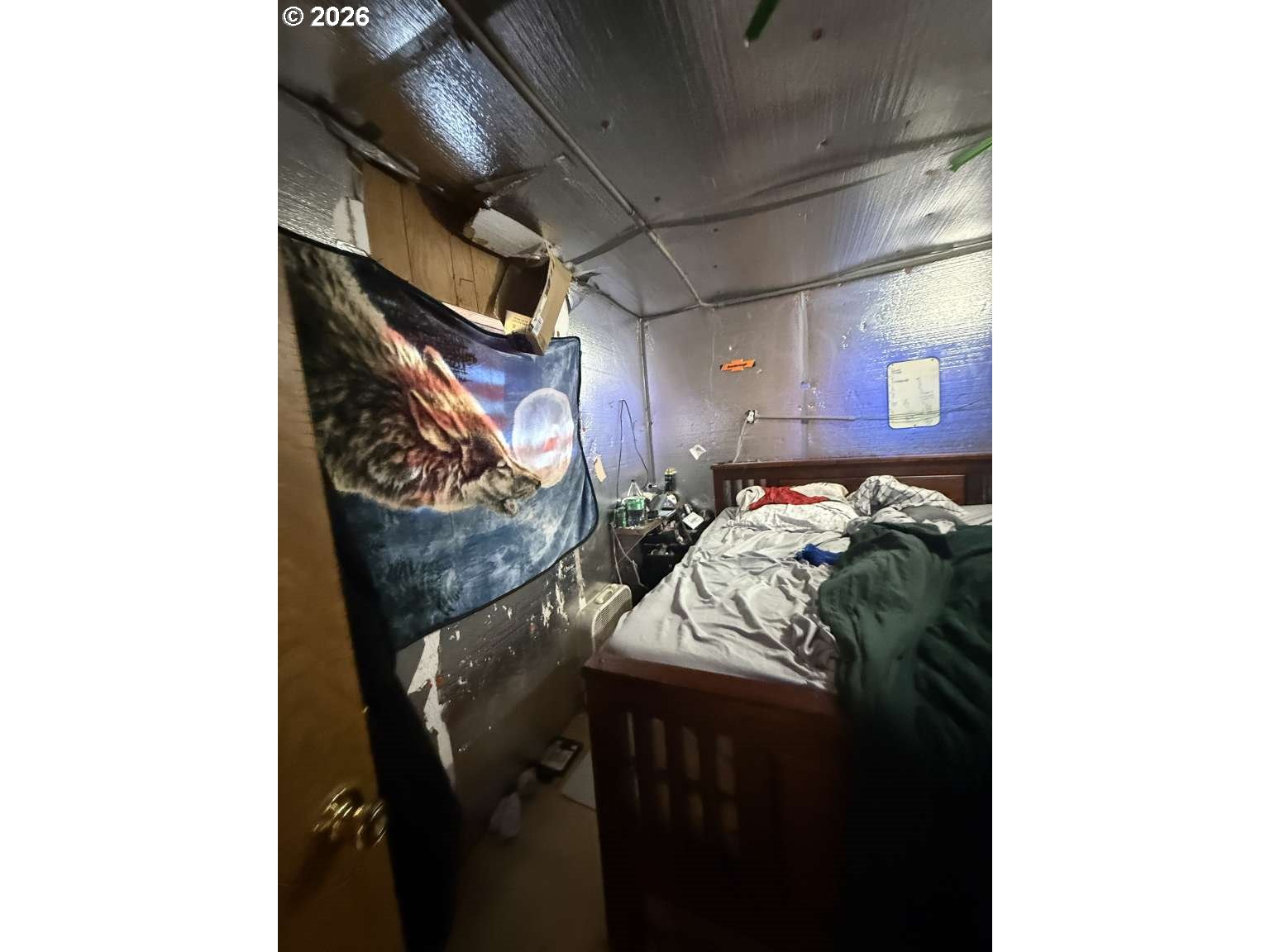 10770 Clow Corner Road Dallas, OR 97338 - Photo 6 of 8 a bed room with a bed and a painting