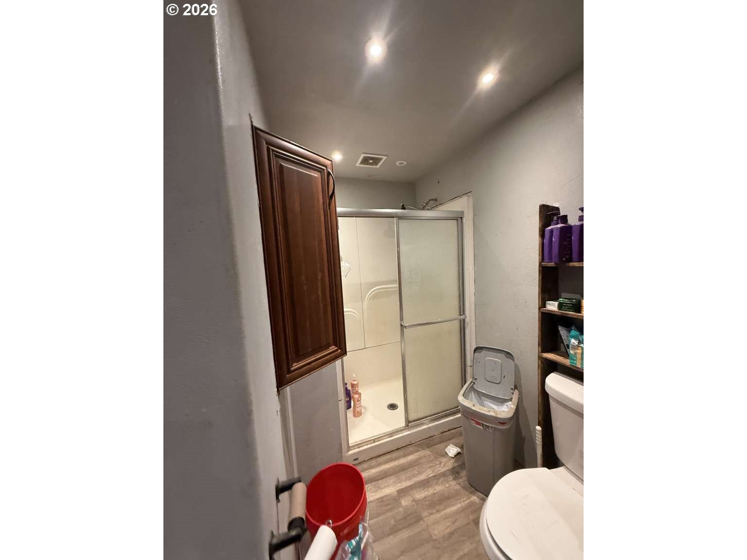 10770 Clow Corner Road Dallas, OR 97338 - Photo 8 of 8 a bathroom with a toilet and a shower