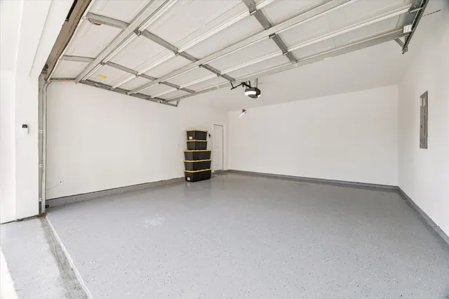 a view of empty room with stairs