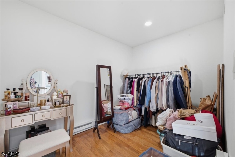 192 Bryans Road Hampton, NJ 08827 - Photo 13 of 33 a view of walk in closet with clothes and shoes