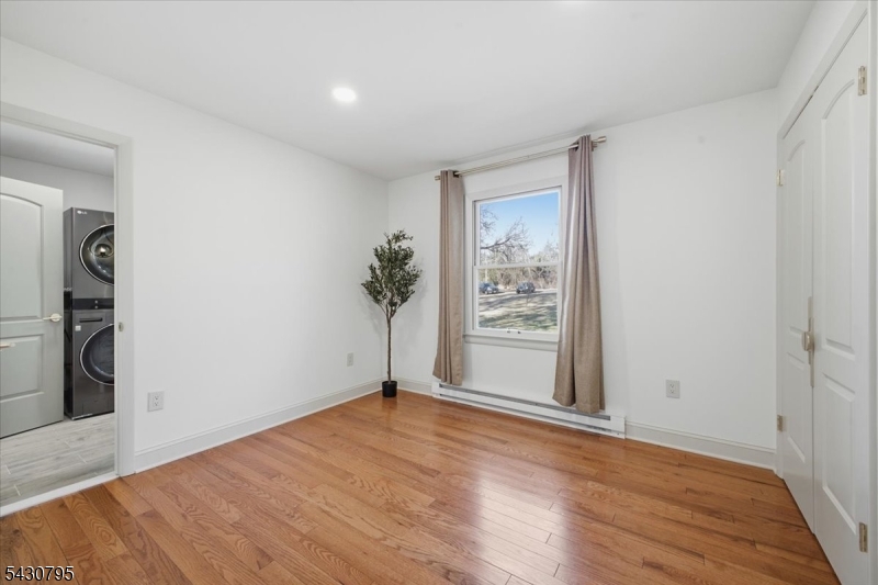 192 Bryans Road Hampton, NJ 08827 - Photo 17 of 33 a view of a room with wooden floor and a window