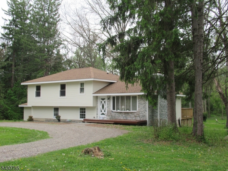 192 Bryans Road Hampton, NJ 08827 - Photo 2 of 33 a front view of a house with a garden and yard