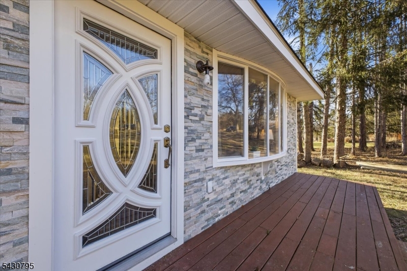 192 Bryans Road Hampton, NJ 08827 - Photo 6 of 33 a view of a entryway door with wooden floor
