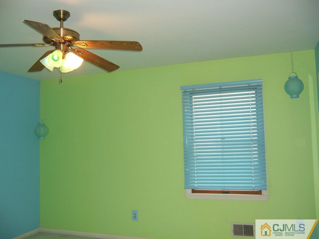 163 Kimberly Road Colonia, NJ 07067 - Photo 14 of 22 a view of a window and a fan