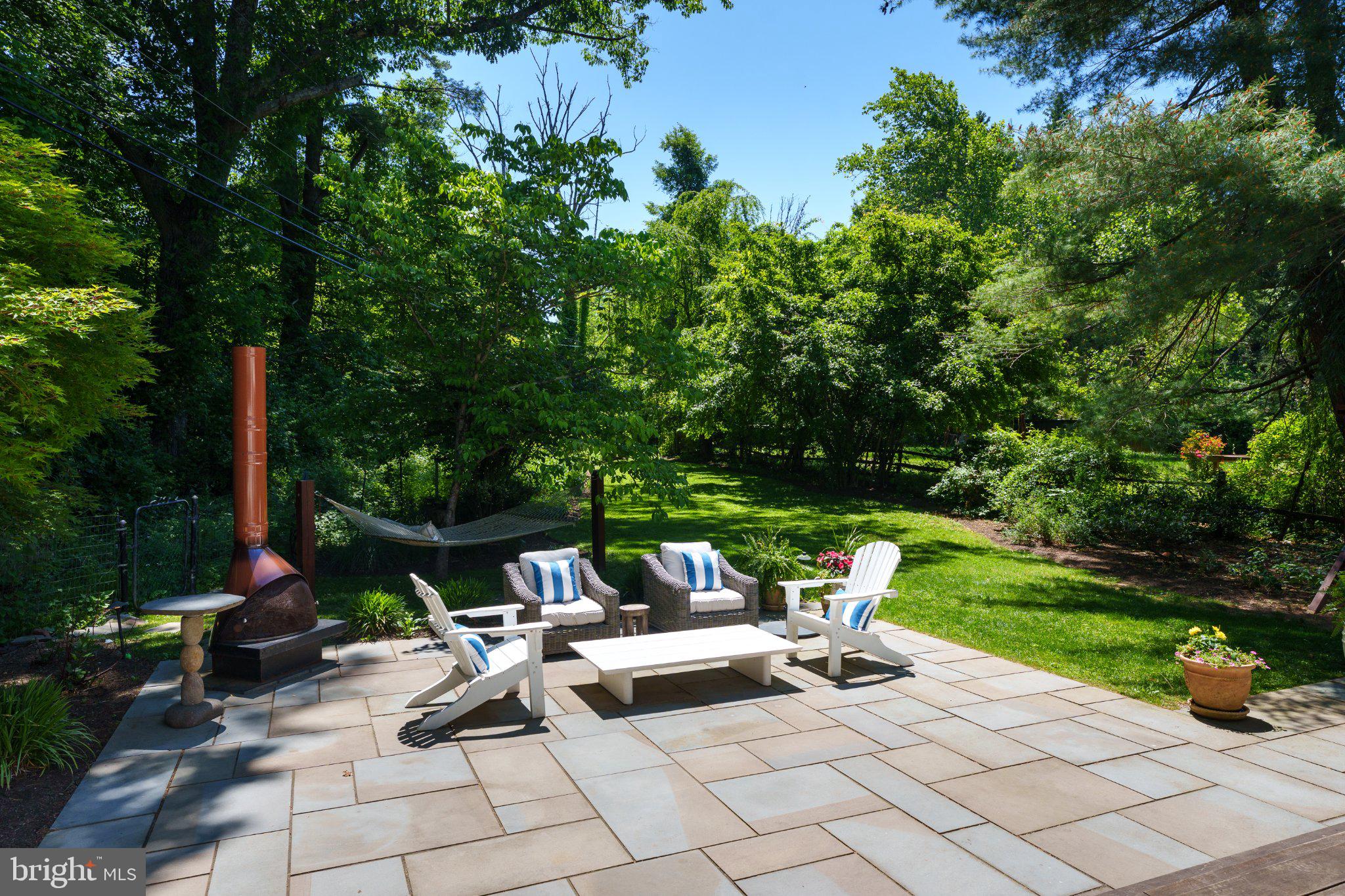 528 Mercer Road Princeton, NJ 08540 - Photo 29 of 43 Serene patio amidst lush greenery.
