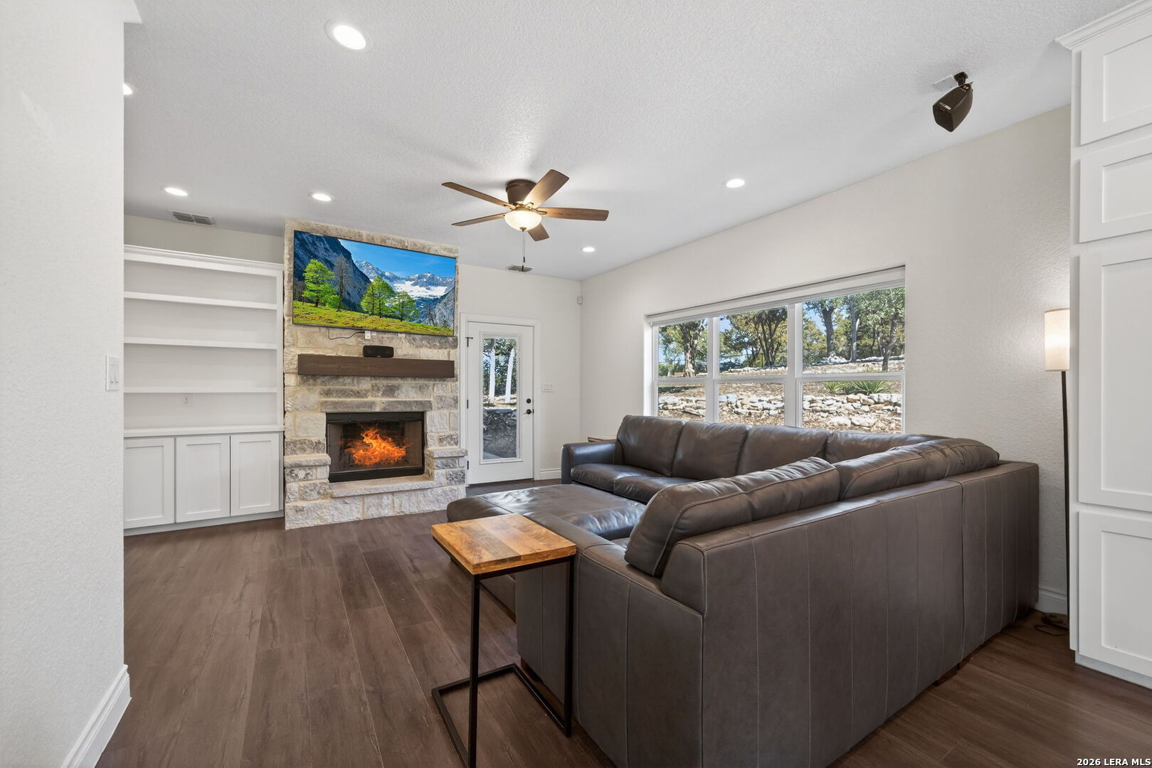 616 Crossman Fischer, TX 78623 - Photo 11 of 48 a living room with furniture and a fireplace