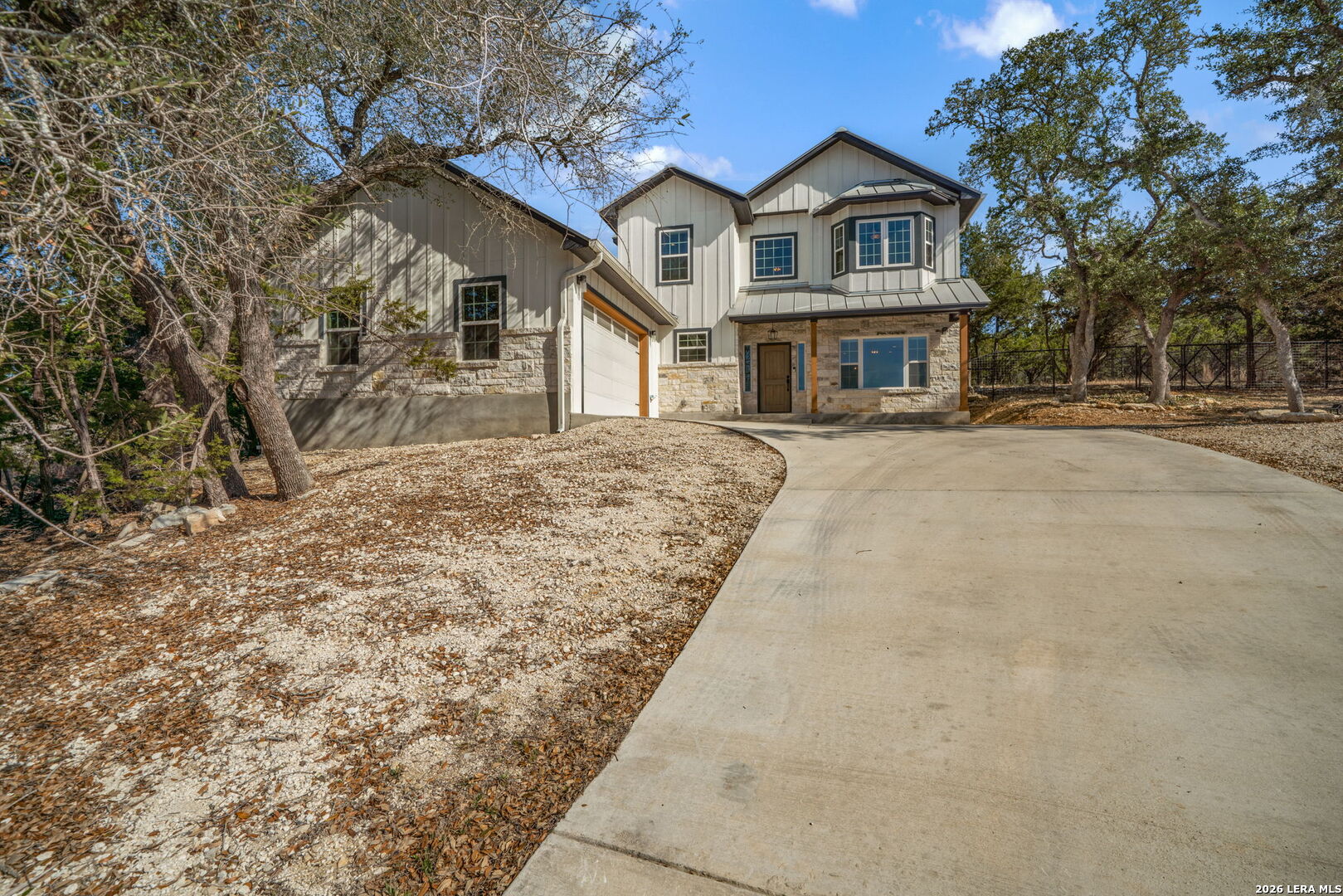 616 Crossman Fischer, TX 78623 - Photo 2 of 48 a front view of a house with a yard and garage