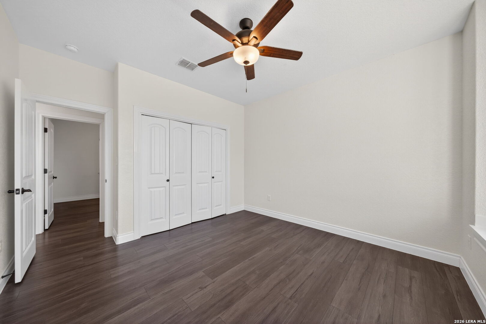 616 Crossman Fischer, TX 78623 - Photo 28 of 48 a view of an empty room with wooden floor