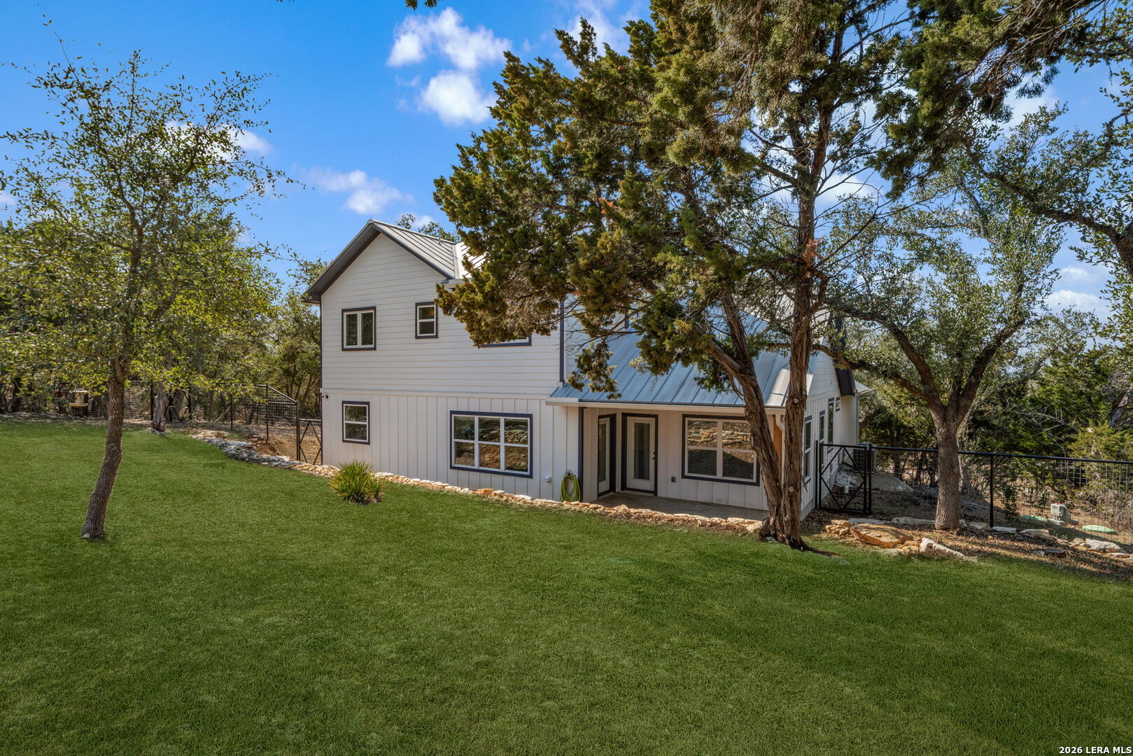 616 Crossman Fischer, TX 78623 - Photo 32 of 48 a front view of a house with a garden