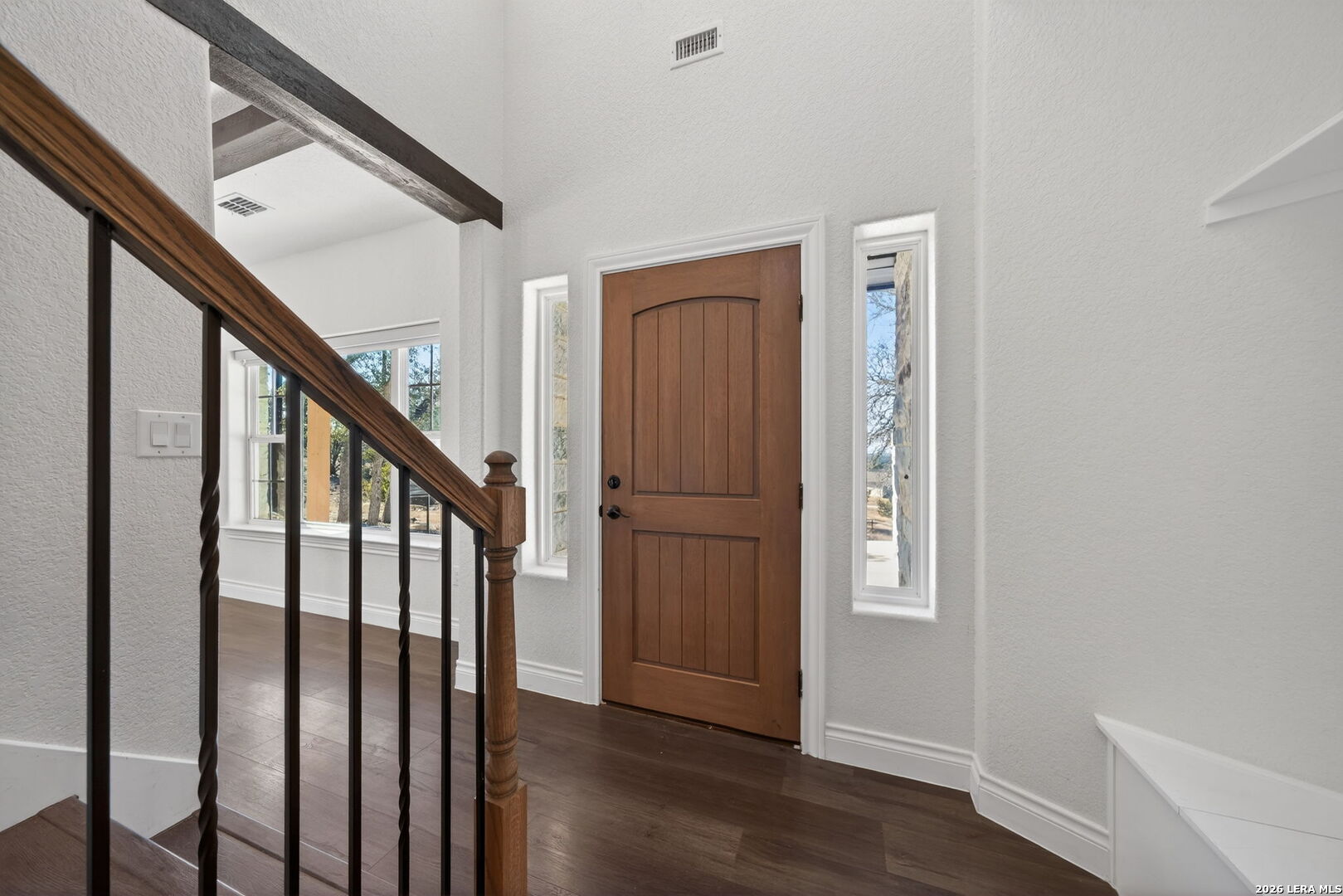 616 Crossman Fischer, TX 78623 - Photo 5 of 48 a view of an entryway with wooden floor