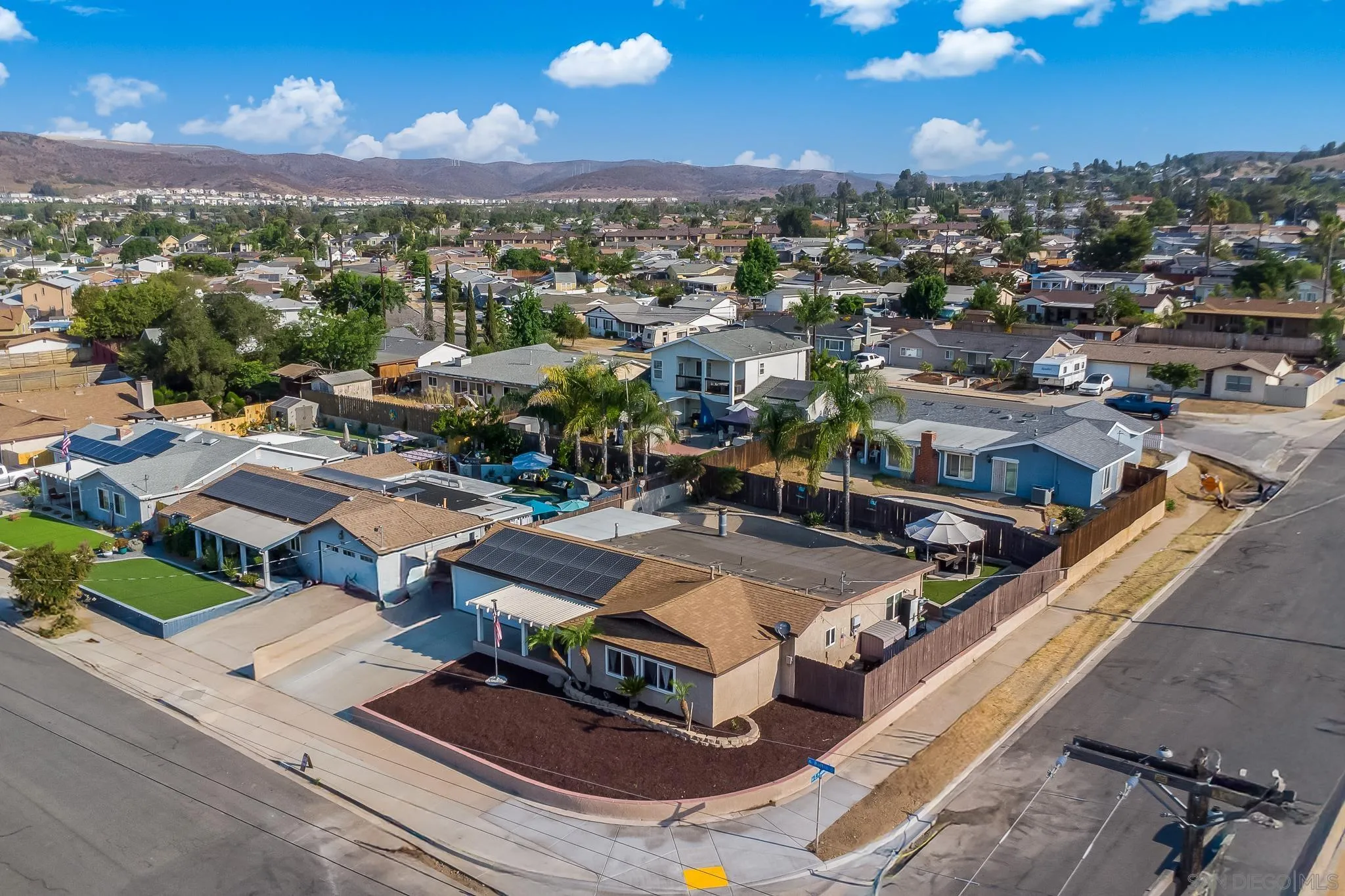 9276 Ruffin Road Santee, CA 92071 - Photo 34 of 40 an aerial view of residential houses with outdoor space and city view