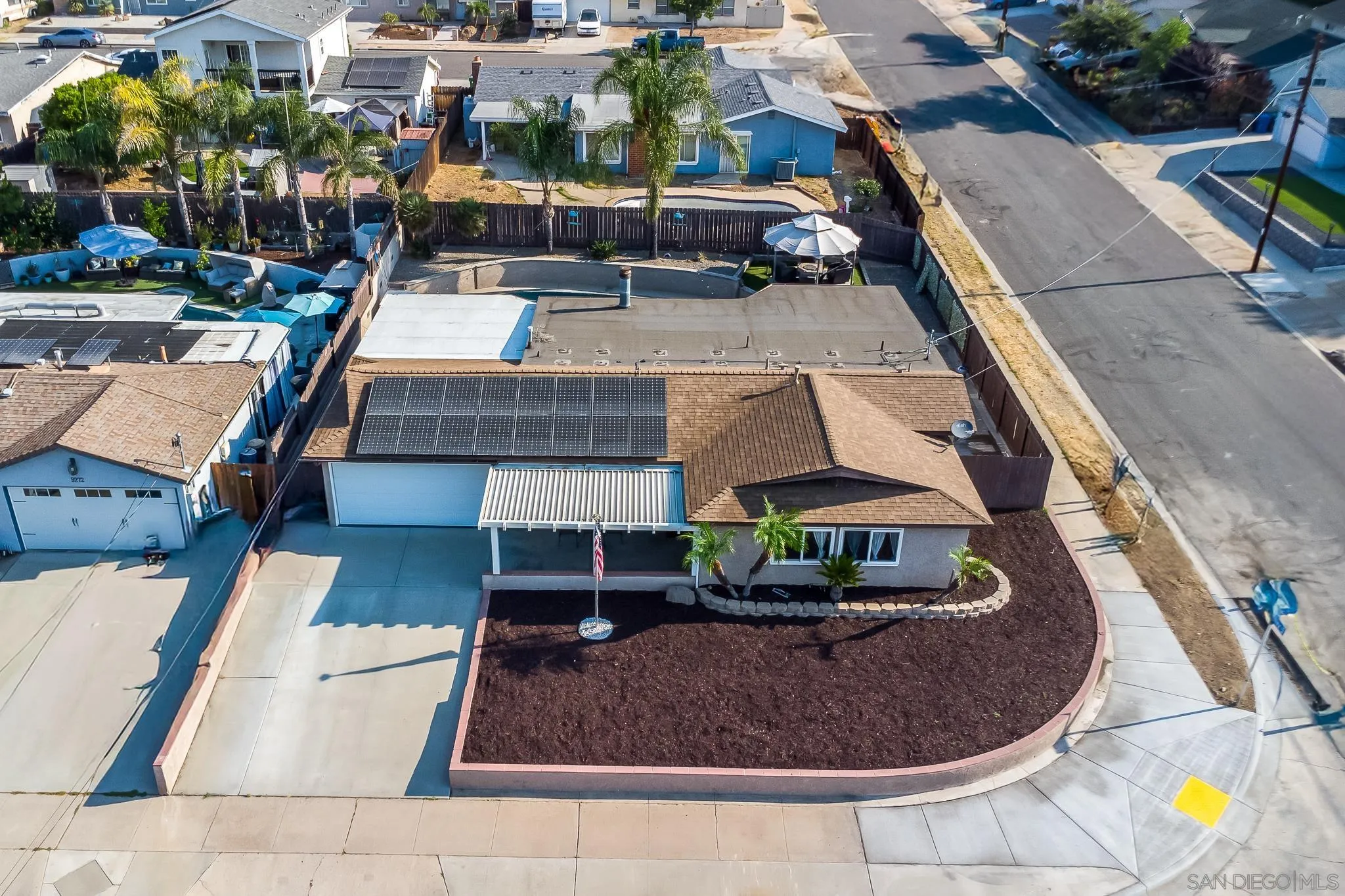 9276 Ruffin Road Santee, CA 92071 - Photo 35 of 40 an aerial view of a house with a swimming pool