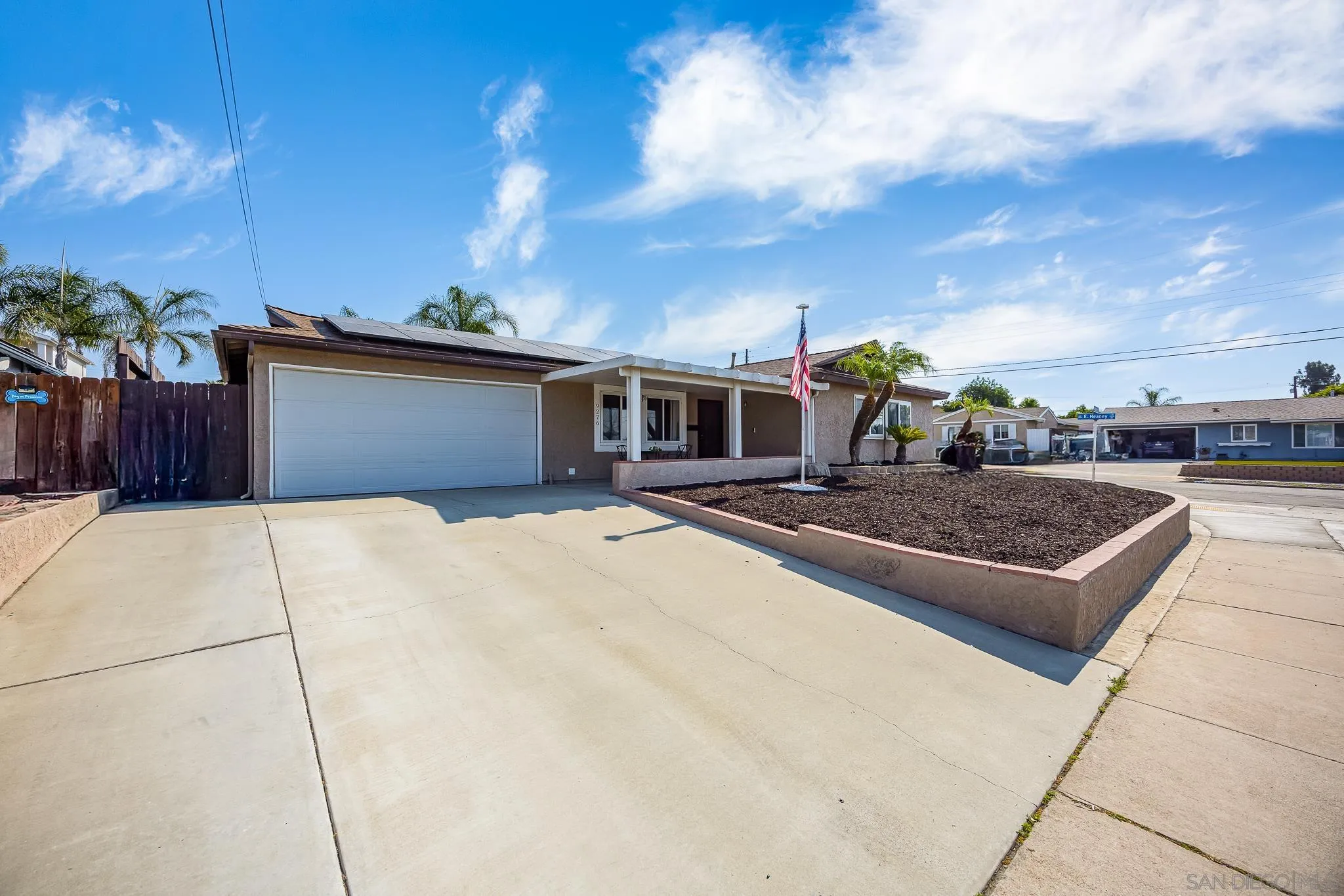 9276 Ruffin Road Santee, CA 92071 - Photo 8 of 40 a front view of a house with a yard