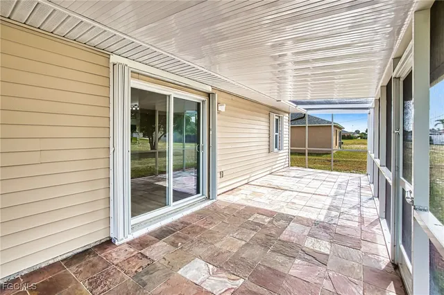 a view of house with backyard